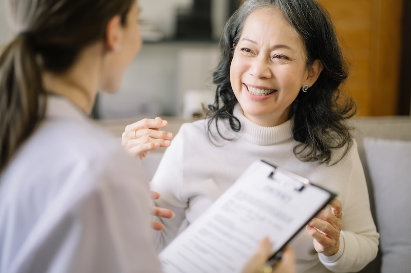 Nurse reviewing care plan with patient